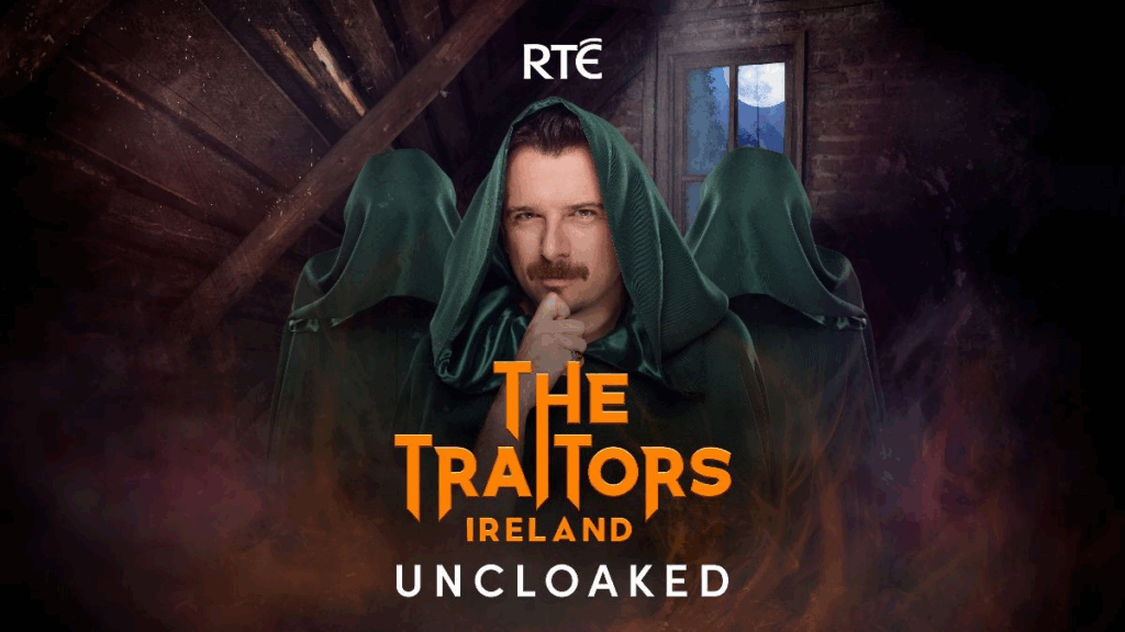 The Traitors Ireland Uncoaked presenter Kevin McGahern is pictured in a green Traitors cloak